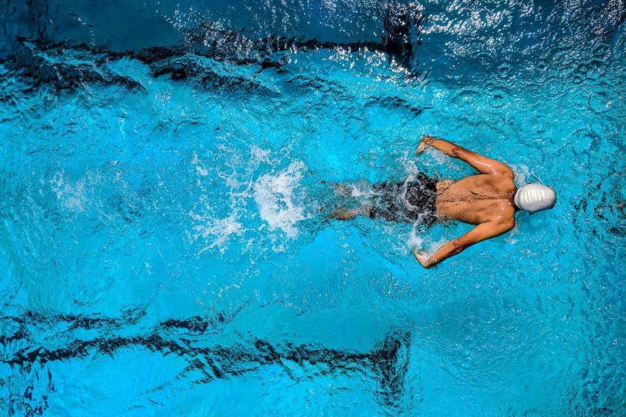 Man swimming in pool